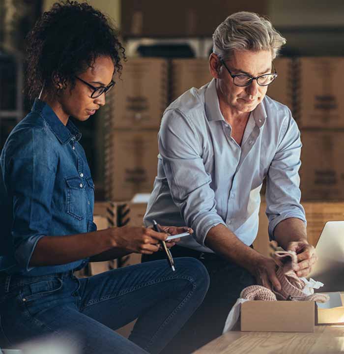 two employees in a warehouse